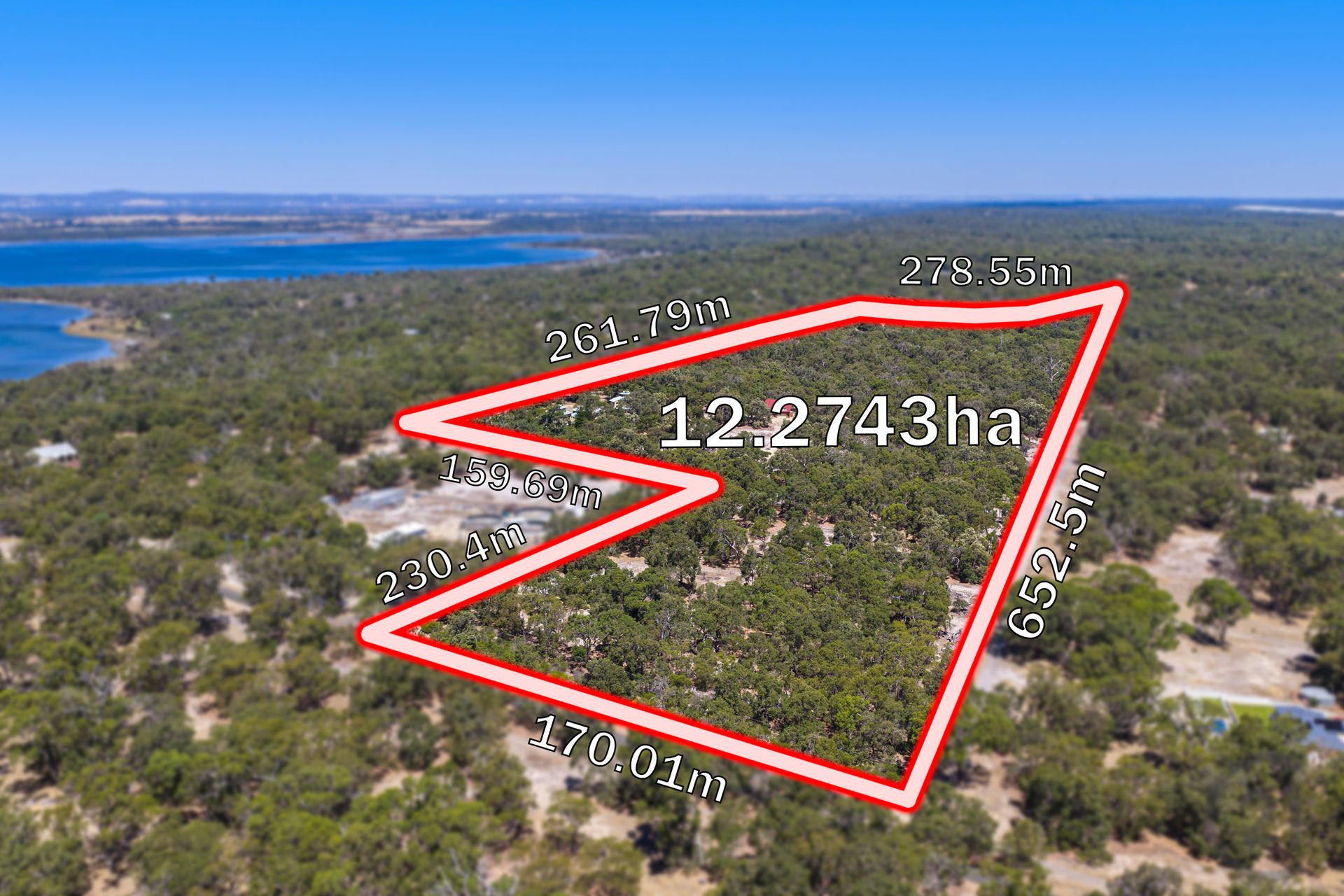 Lot 100 boundary over woodland and water